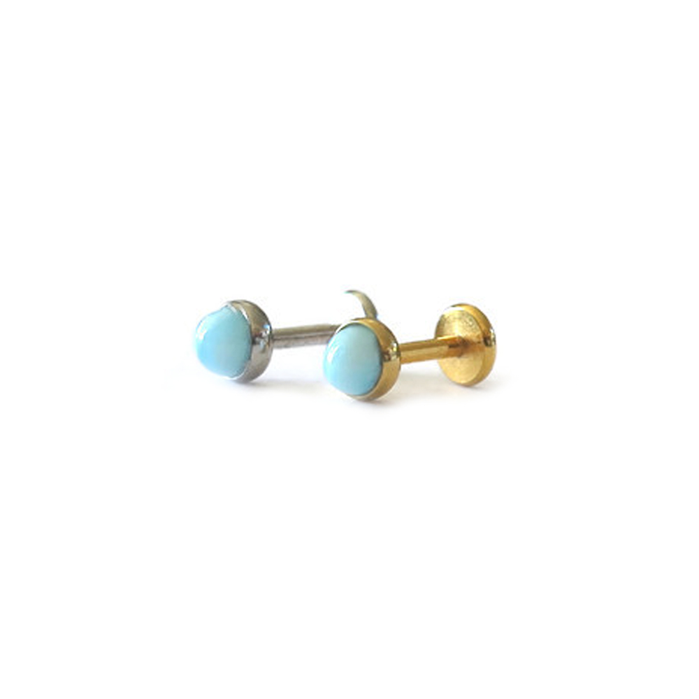 Larimar flat back stud earrings in 18K gold plated and rhodium plated finishes, flat lay